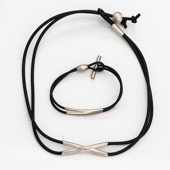 Christoph Burger, A necklace and a bracelet "Edition amour", sterling silver and rubber strap. Lapponia 2003.