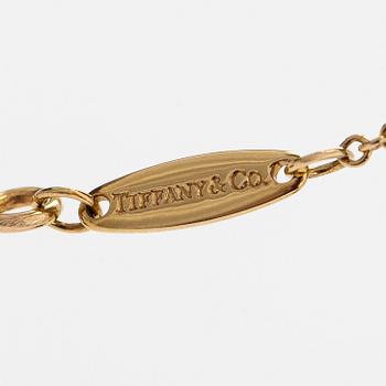Tiffany & Co, Elsa Peretti, an 18K gold 'Diamonds by the Yard' necklace with a brilliant-cut diamond.