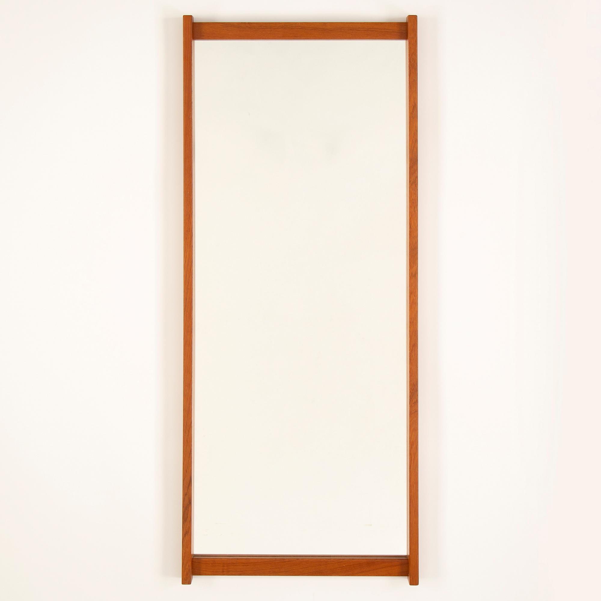 A 1960's 'Schlager'  teak mirror from Fröseke, AB Nybrofabriken.