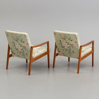 A pair of teak armchairs, 1960's.