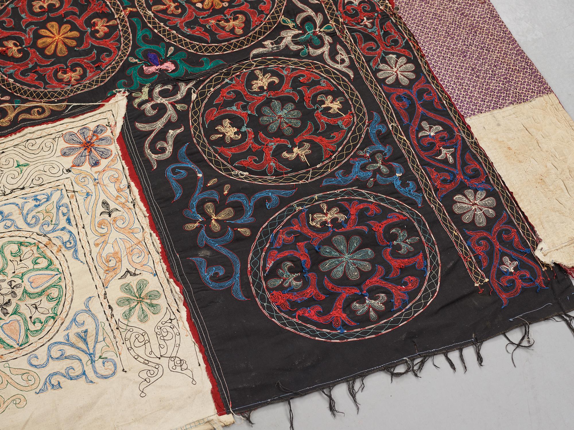 A Suzani textile, ca 247 x 128 cm.