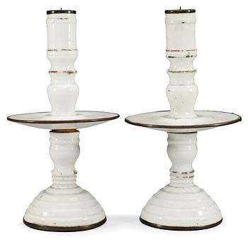 1542. A pair of white glazed candlesticks, Qing dynasty, early 18th Century.