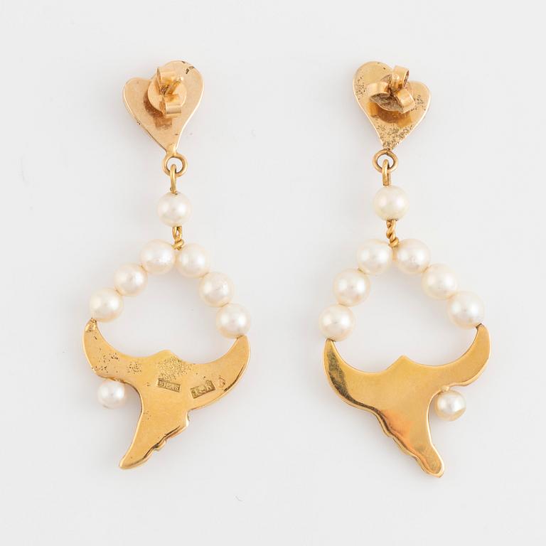 Gold and cultured pearl earrings.