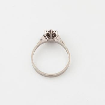 A single cut diamond ring.