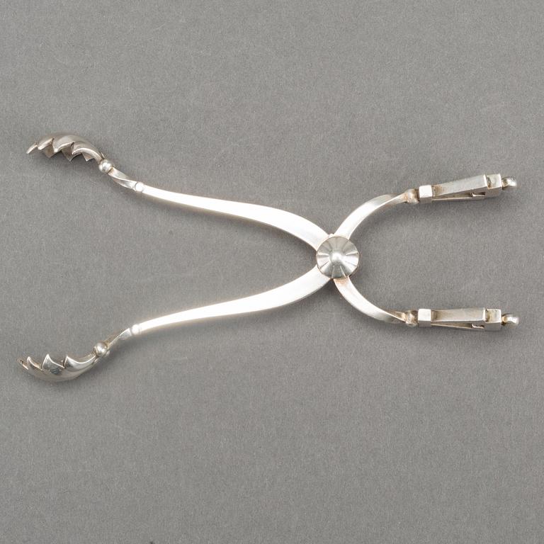 A Danish 20th century silver suger tongs mark of Georg Jensen, around 1930'.