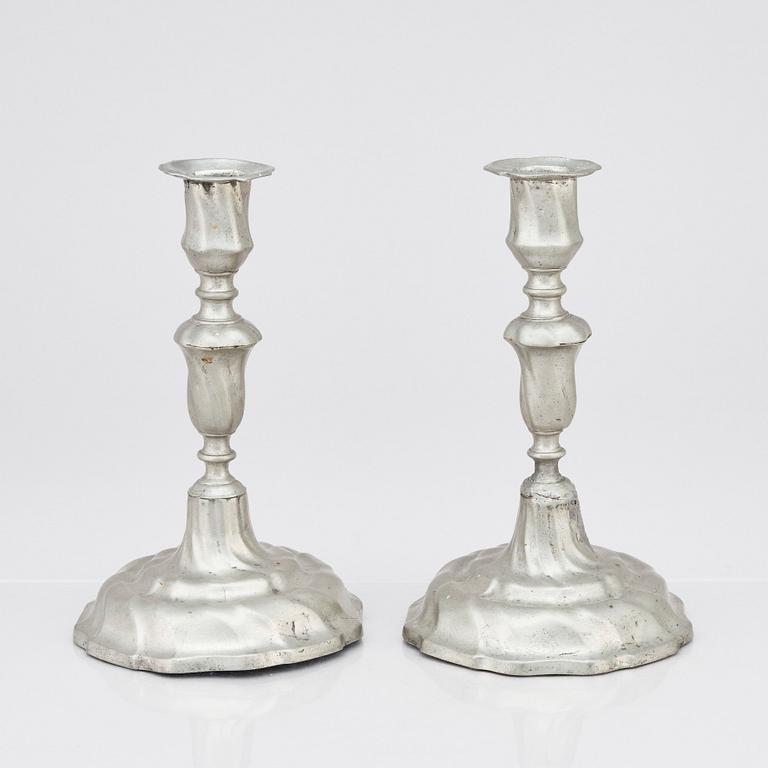 A pair of Rococo pewter candlesticks by C Sauer 1749.