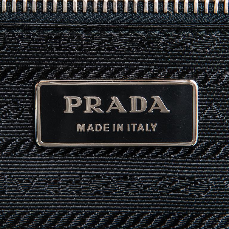 Prada, suitcase.