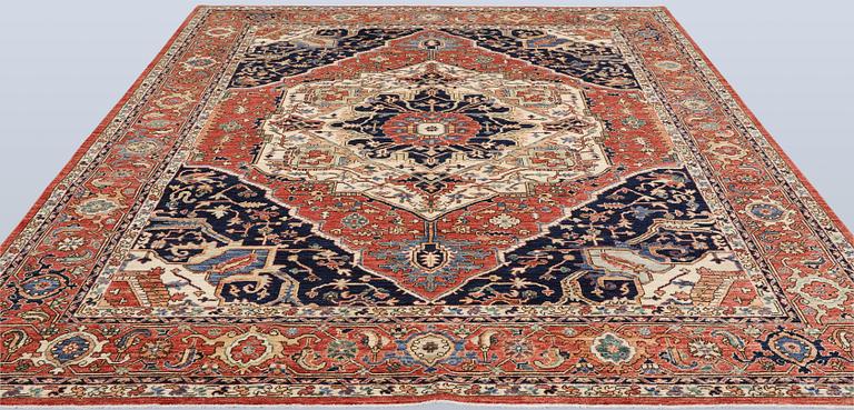 A Zigler, Heris Design carpet, 297 x 247 cm.