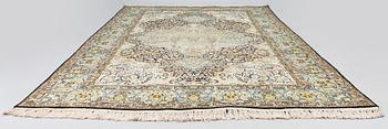 An old part silk oriental rug, ca 278 x 178 cm.