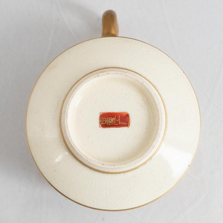 A Japanese satsuma ware teaservice, 10 pieces, 20th century.