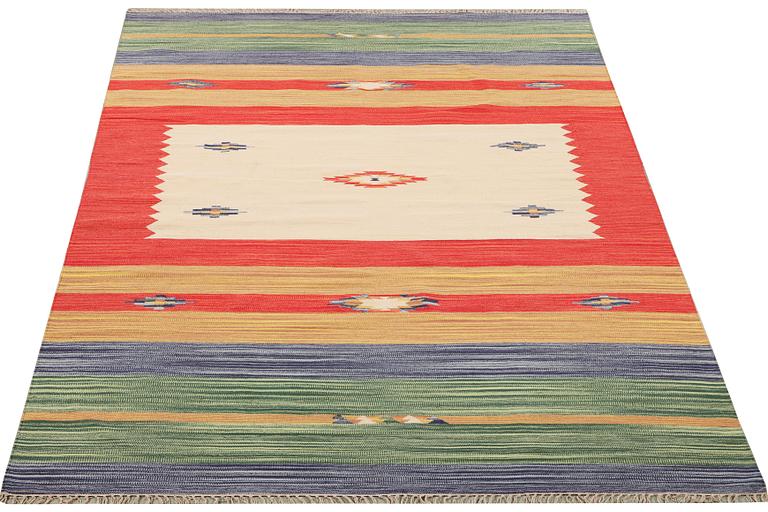 A Durry carpet, c. 300 x 200 cm.