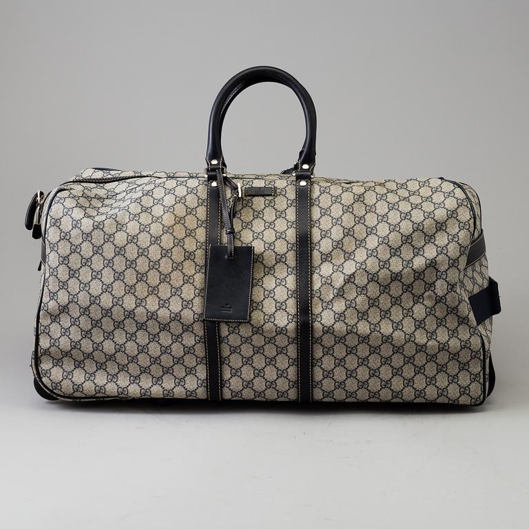 VÄSKA/RULLVÄSKA, Gucci.