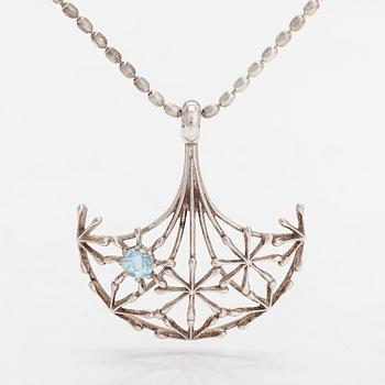 A sterling silver necklace and topaz, 'The Woman's Voice' by Kirsti Doukas, Kalevala Koru, designed in 2006.
