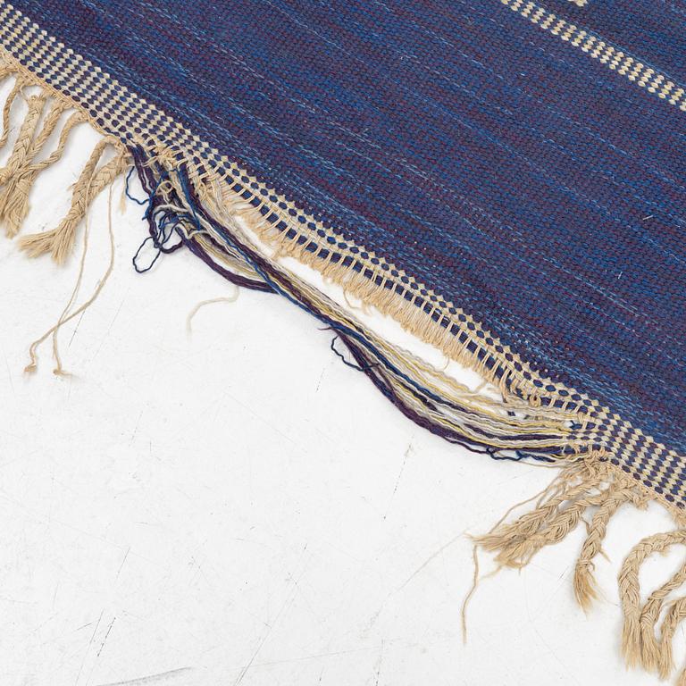 A flat weave, mid 20th Century, circa 293 x 187 cm.