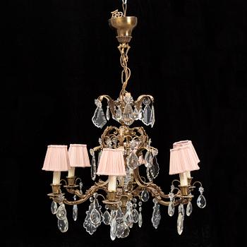 A brass and glass chandelier.
