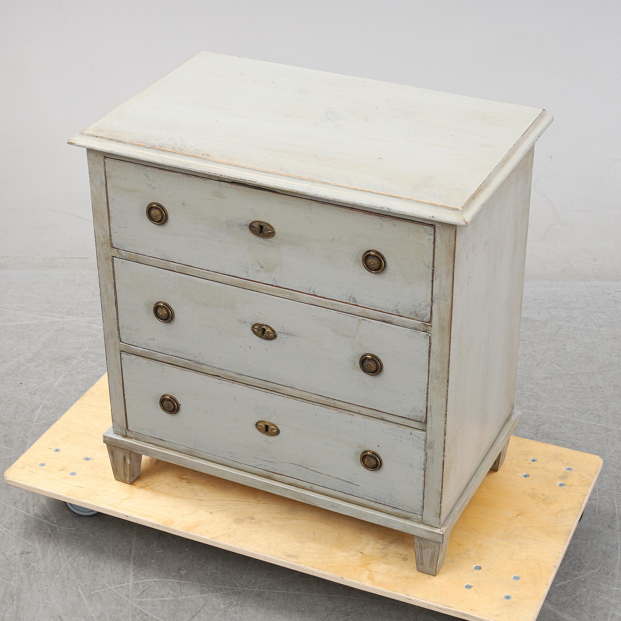 A Swedish painted chest of drawers, around the year 1900.