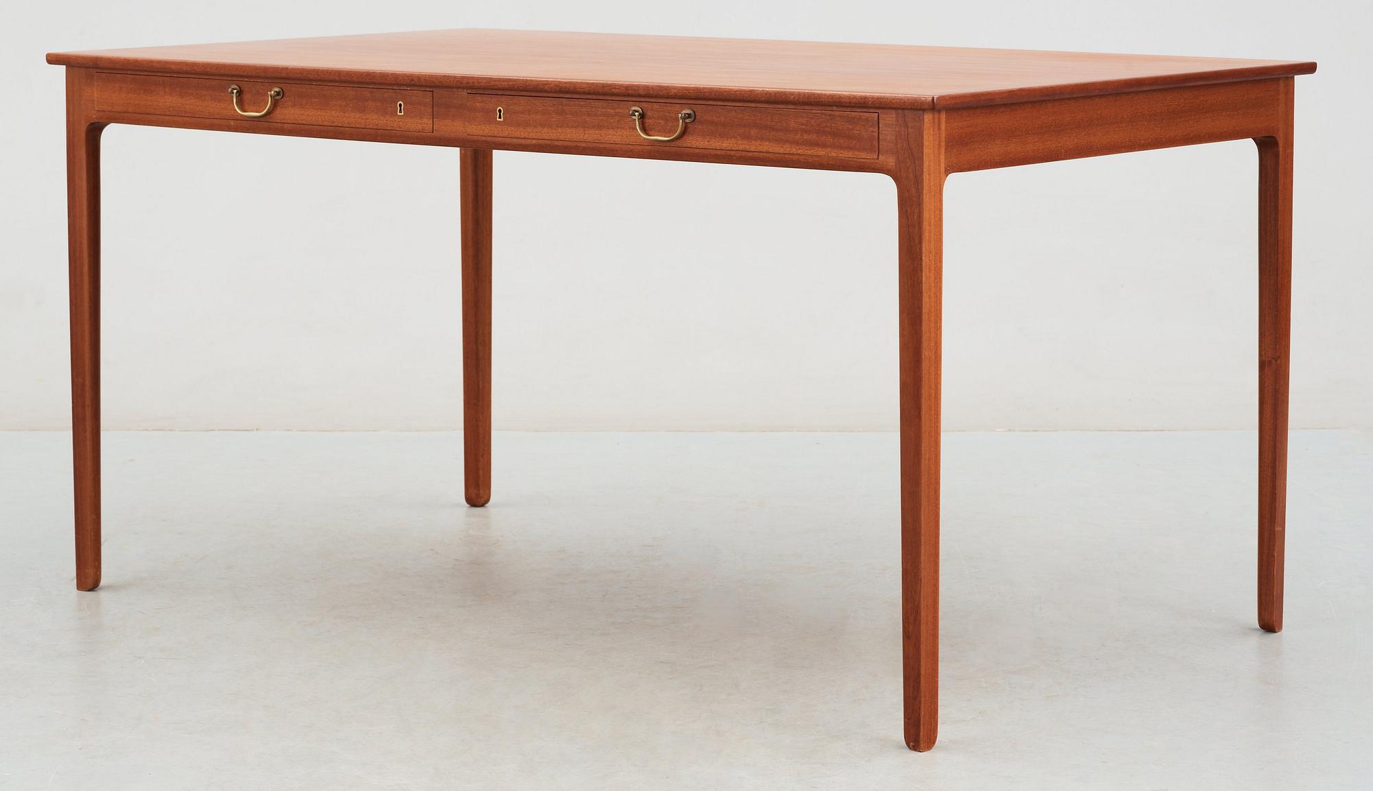 An Ole Wanscher mahogany desk, A. J. Iversen, Denmark 1960's.
