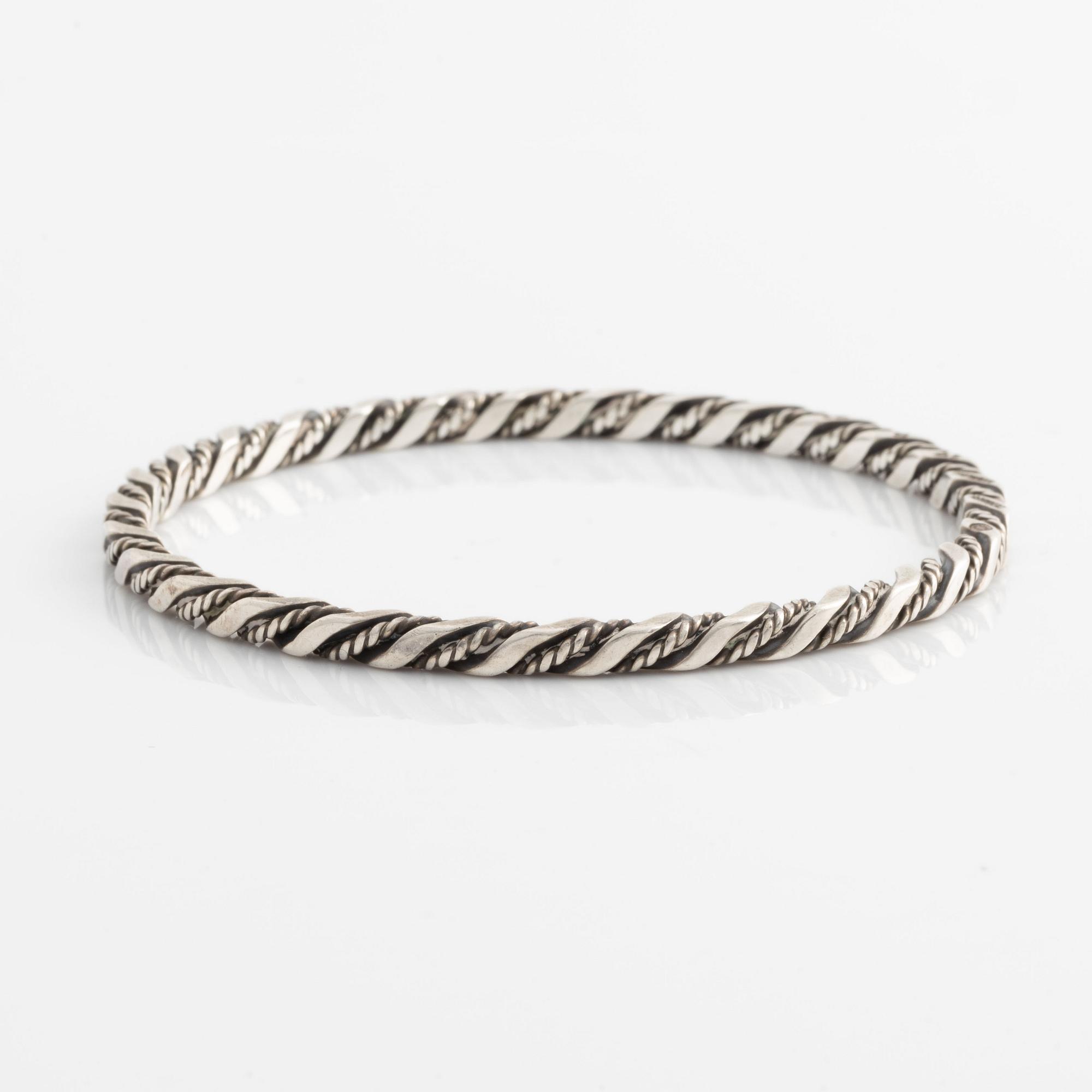 A Georg Jensen bangle in sterling silver.