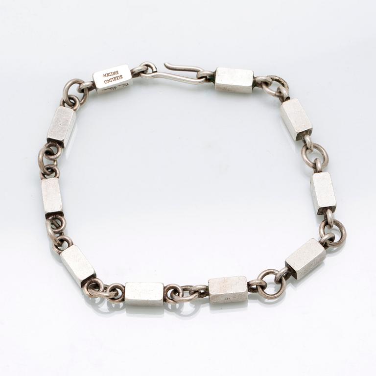 A Swedish sterling sivler bracelet mark of Wiwen Nilsson Lund 1962 length 24 cm, weight 347 grams,