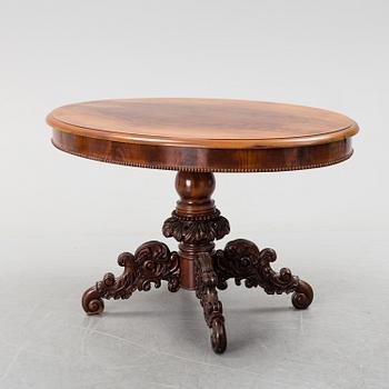 A mid 19th century mahogny table.