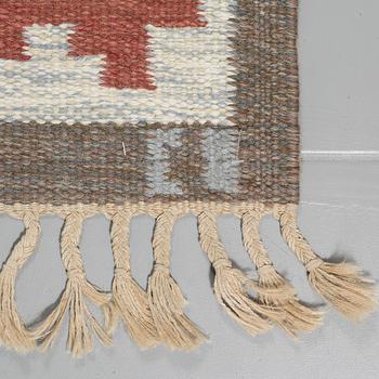 A flat weave, signed, third quarter of the 20th century, 200 x 141 cm.