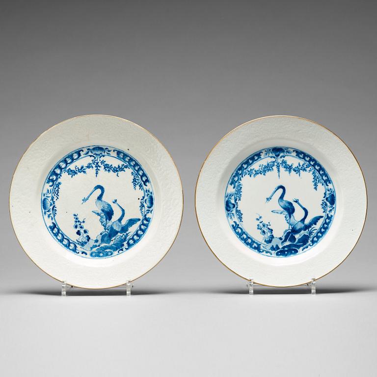 A pair of blue and white armorial dishes, Qing dynasty, 18th Century.