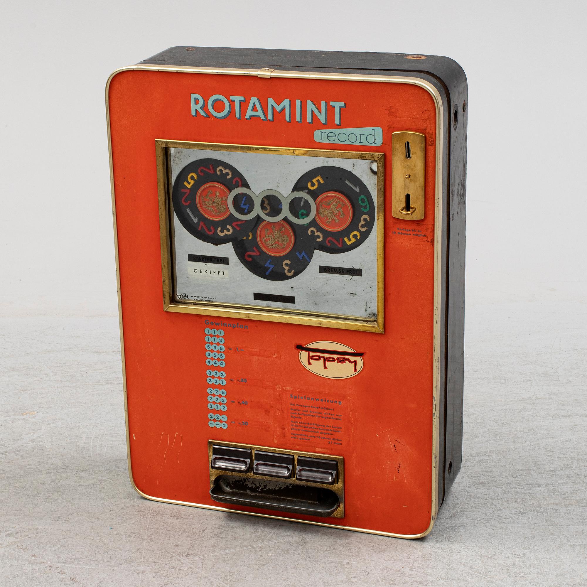a mid 20th century Rotamint Record gambling machine.