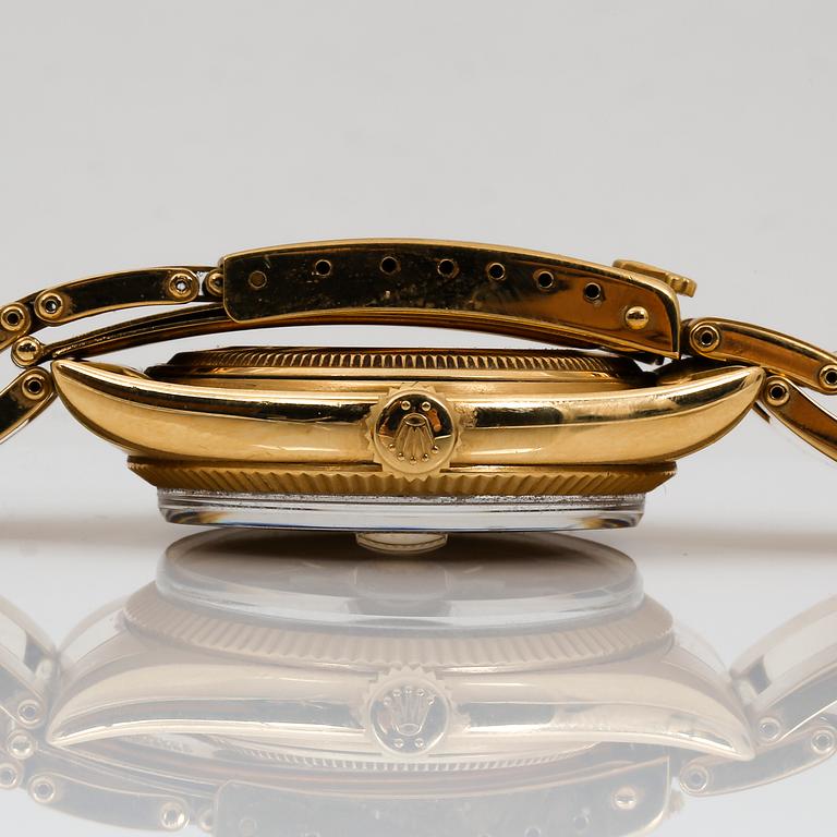 HERRARMBANDSUR, 18 K guld, Rolex Oyster Perpetual Datejust, 1964. Total vikt ca 112 gram.