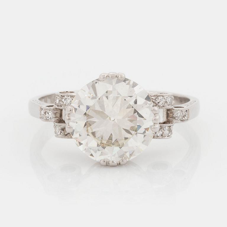 A platinum ring set with an old-cut diamond weight ca 3.00 cts quality ca J/K vs.