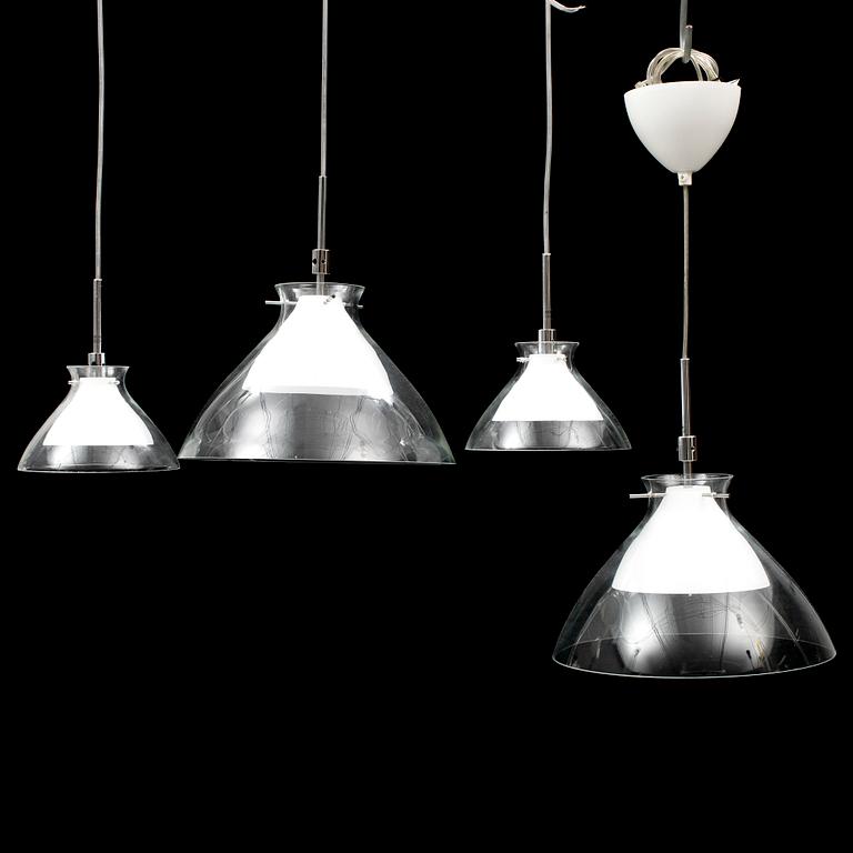 Four Belid ceiling lamps.