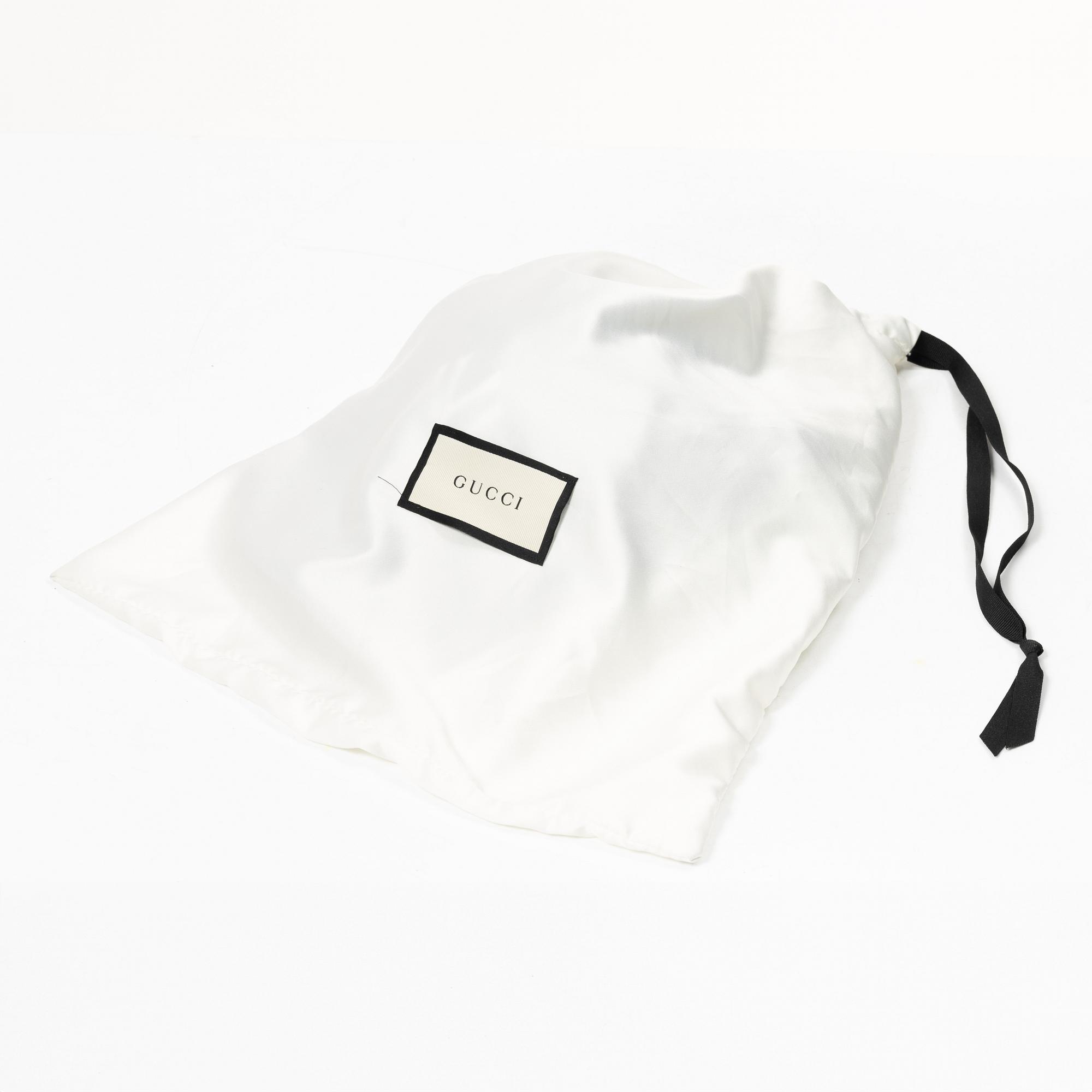 Gucci, NY Yankees baseball cap.