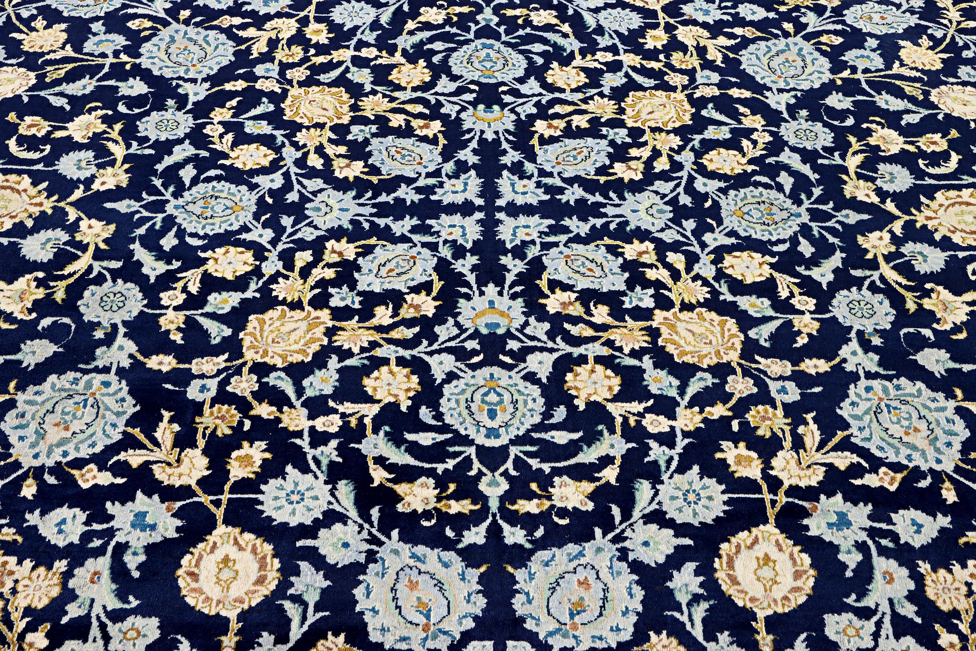 A Kashan carpet, c. 395 x 305 cm.