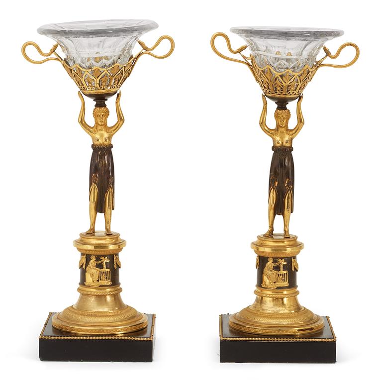 A pair of Austrian Empire early 19th century centre pieces.