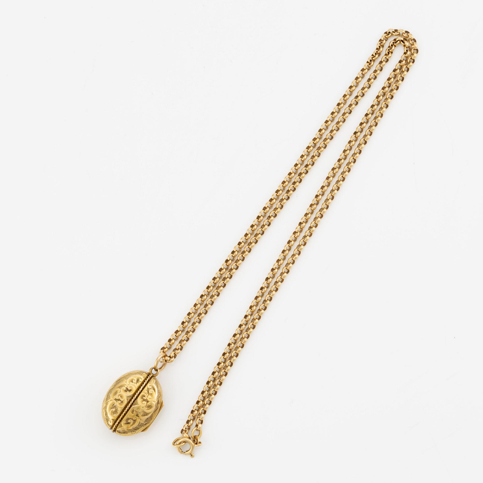 Öppningsbar medaljong med kedja, 18K guld.