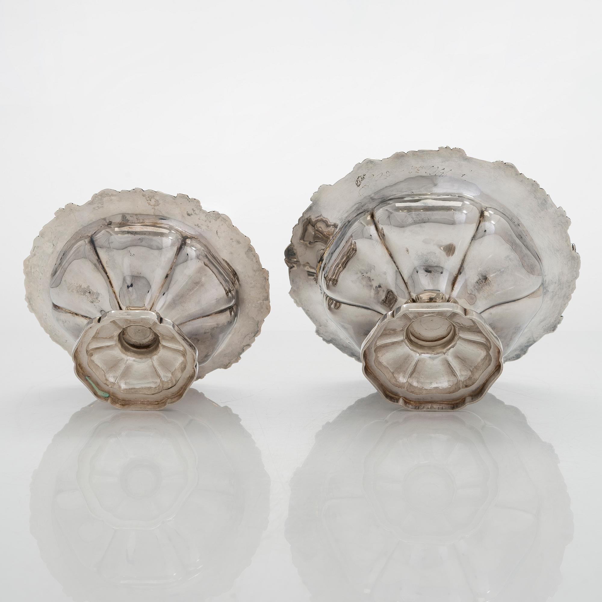 A set of two 1920s-1930s silver sweetmeat basket with sugar tong and jam spoon, Uusi Kultaseppä Oy, Helsinki, Finland.