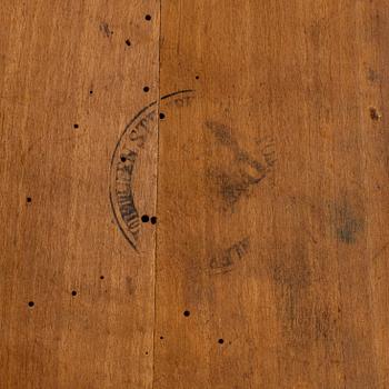 A mahogany veneered table, circa 1800.