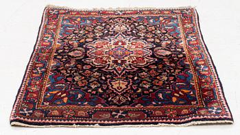 A Sarouk/Jozan rug, c. 86 x 64 cm.