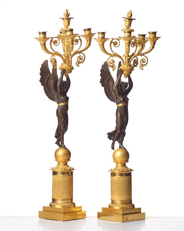 A pair of French  Empire five-light candelabra, sign. Rabiat, bronze maker in Paris 1756-1815.