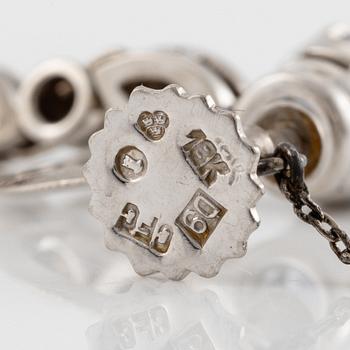 A pair of earrings with sapphires and diamonds, stamped Carlman.