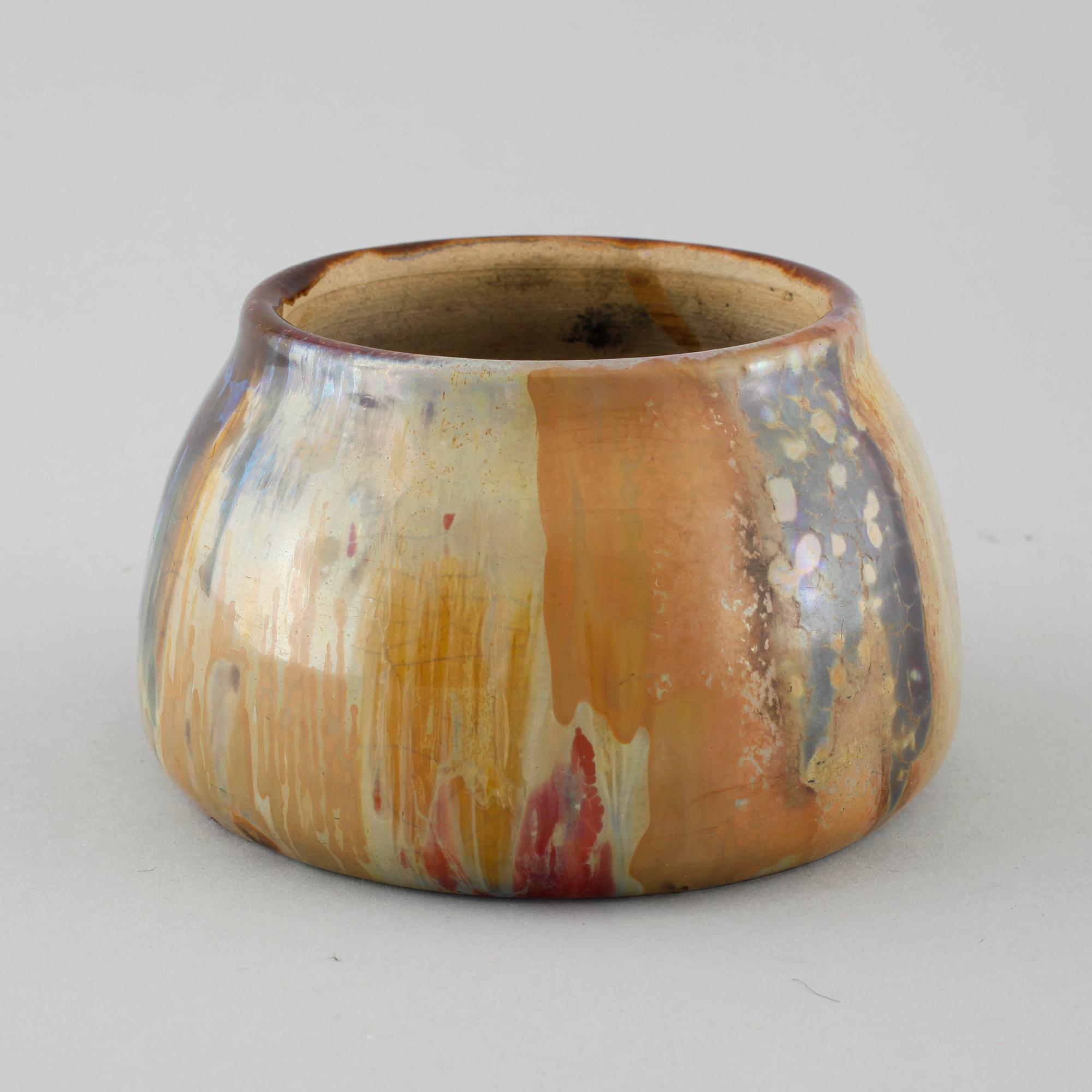 A signed ceramic bowl by Clement Massier, Golfe Juan, first half of the 20th century.