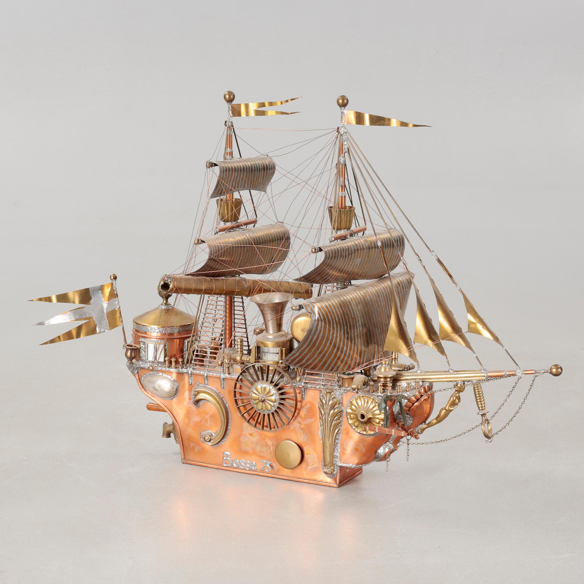 A boat sculpture, dated -75.