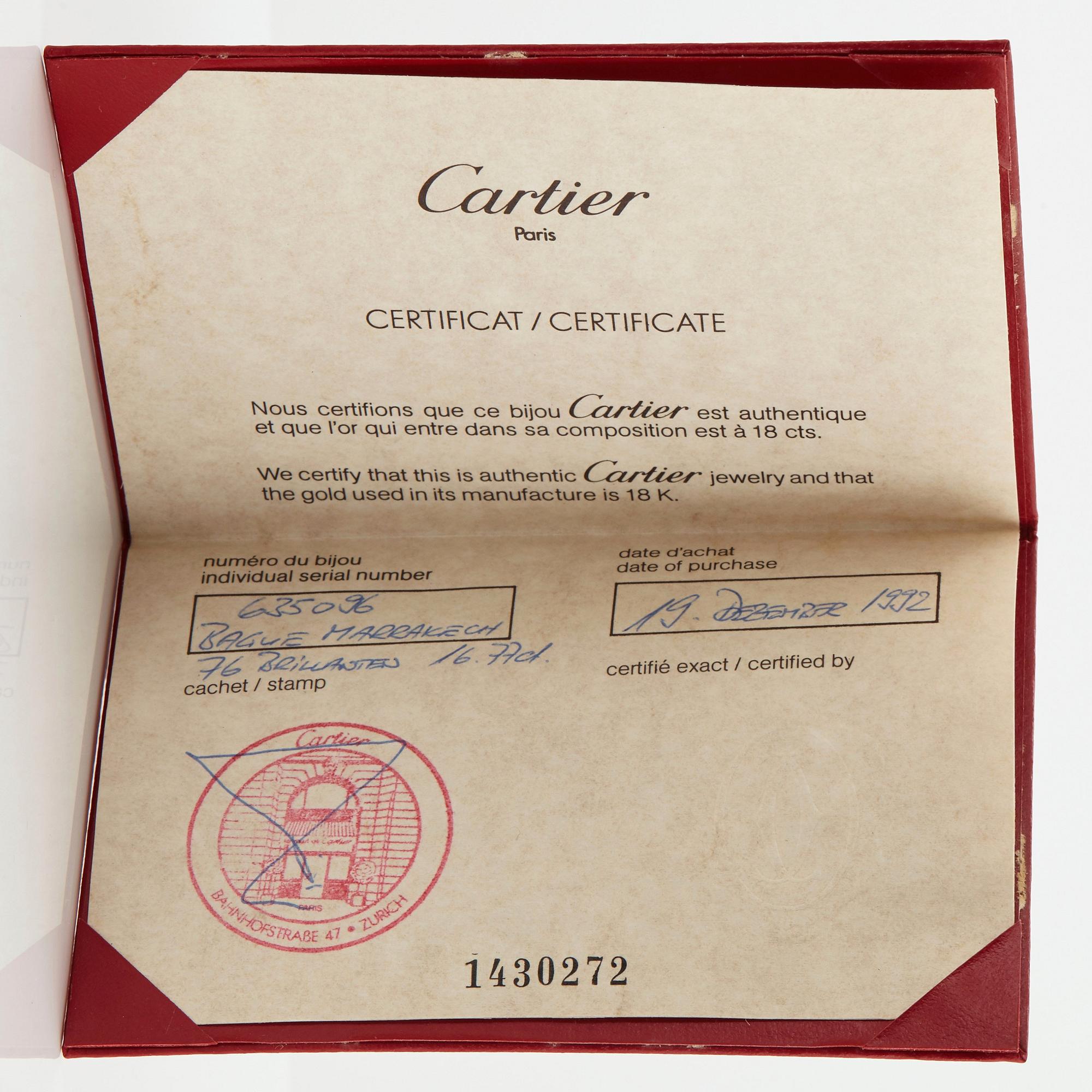 Cartier "Marrakech" an 18K gold bombé ring set with round brilliant-cut diamonds.