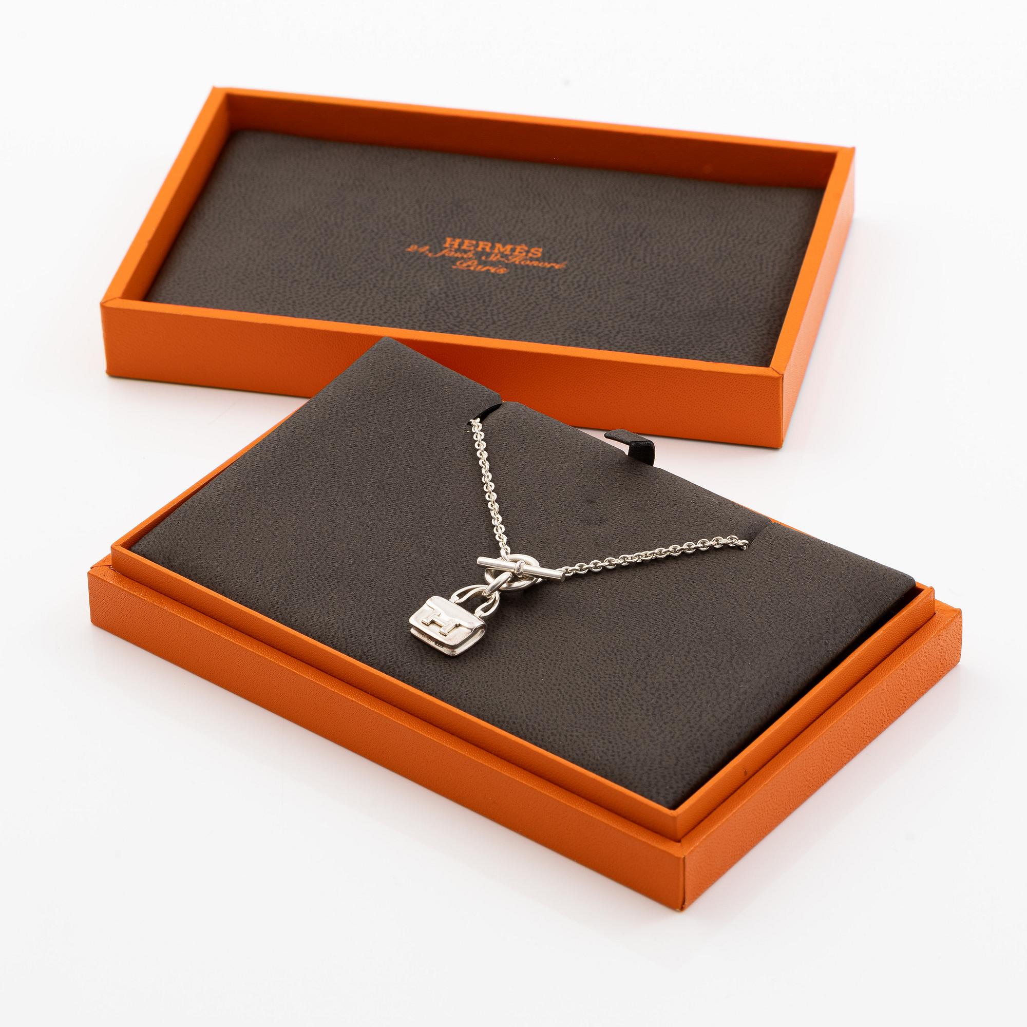 Hermès, Necklace / collar with charm, "Amulettes Constance", silver 925.
