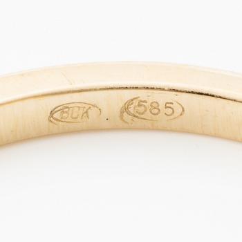 14K gold ring with marquise-cut diamonds.