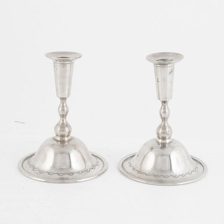 Firma Svenskt Tenn, a pair of pewter candlesticks model "76", Stockholm 1925.