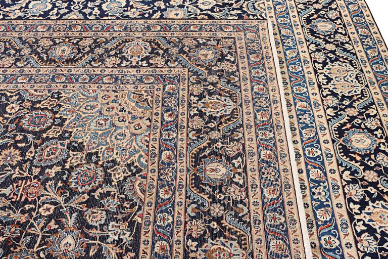 A Keshan carpet, c. 392 x 290 cm.