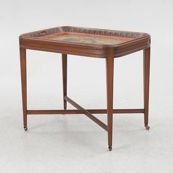 A painted tin tray 19th century with later stand.