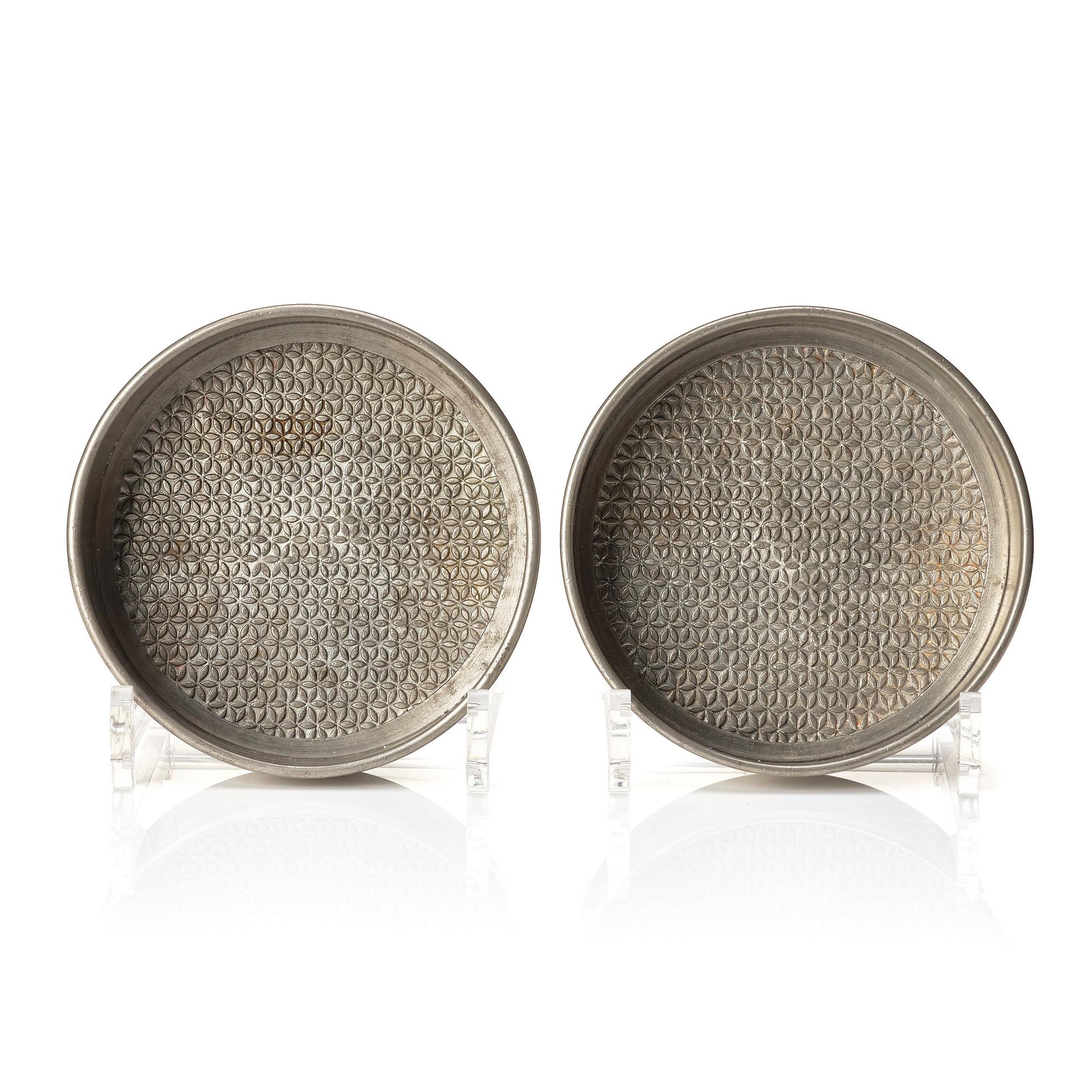 Firma Svenskt Tenn, a pair of pewter coasters, Stockholm 1975.