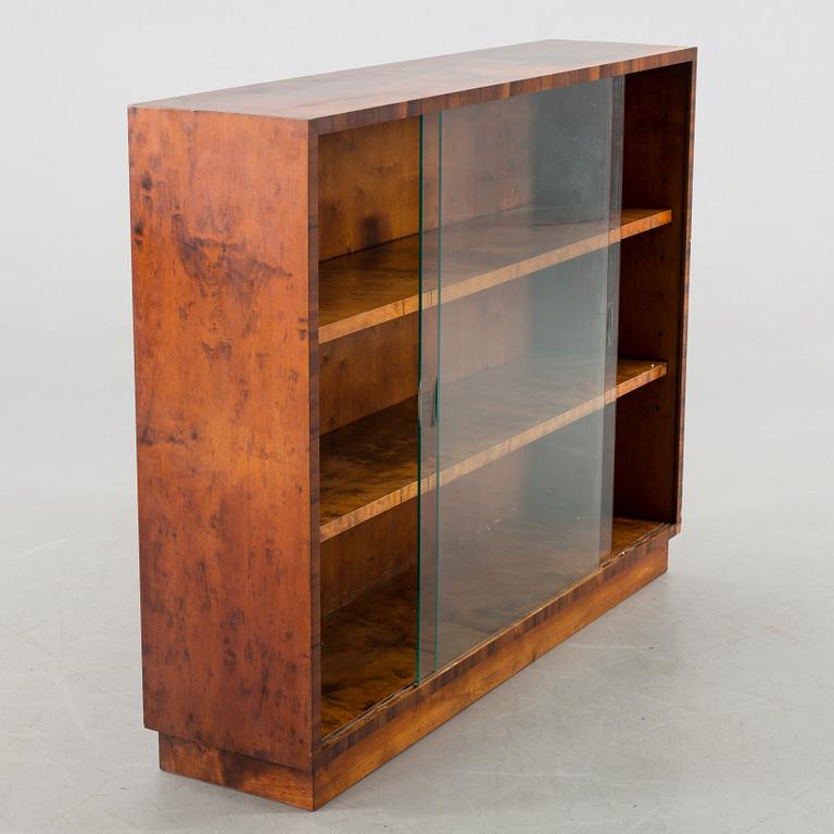 A 20Th CENTURY BOOKCASE.