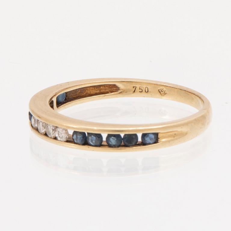 An 18K gold ring and a pair of earrings by H. Stern set with round brilliant cut diamonds and sapphires.